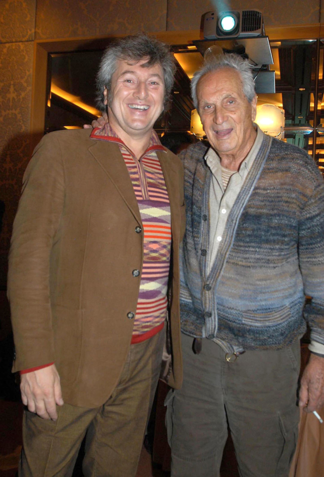 In this photo taken on Nov. 23, 2004 Vittorio Missoni (left) and his father Ottavio smile in Milan, Italy.    AP-Yonhap News