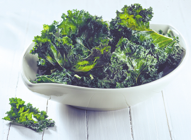Crispy kale sits atop the greens heap now and may be joined by Brussels s prouts and more in 2013.(Chicago Tribune/MCT)