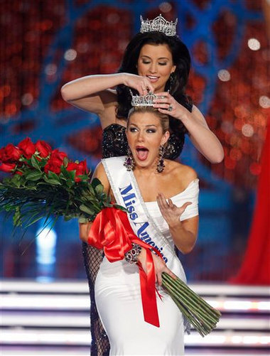 Miss New York Mallory Hagan is crowned Miss America 2013 by Miss America 2012 Laura Kaeppeler on Saturday, Jan. 12, 2013, in Las Vegas. (AP)