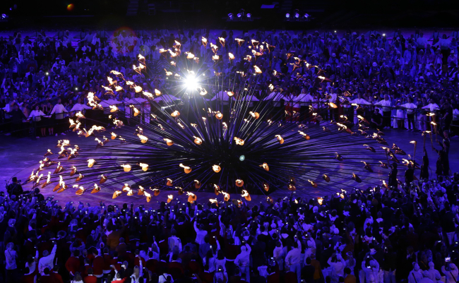 The Olympic cauldron is lit during the Opening Ceremony at the 2012 Summer Olympics on July 28, 2012.    AP-Yonhap News