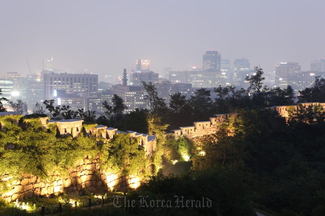 The night view of Seoul with high-rise buildings is seen from the Seoul City Wall at the top of Inwangsan Mountain.   Seoul Metropolitan Government
