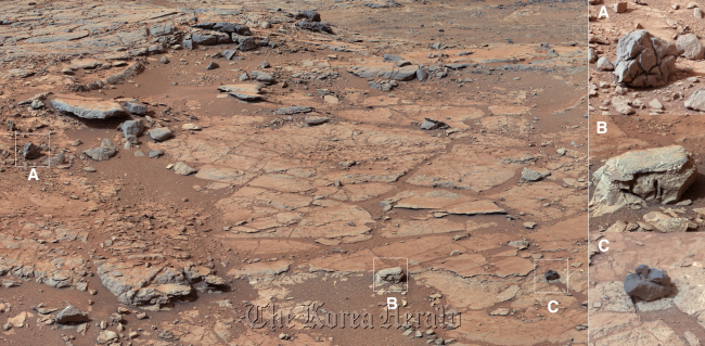 This image released by NASA shows the view of Curiosity’s planned first drilling site.   AP-Yonhap News