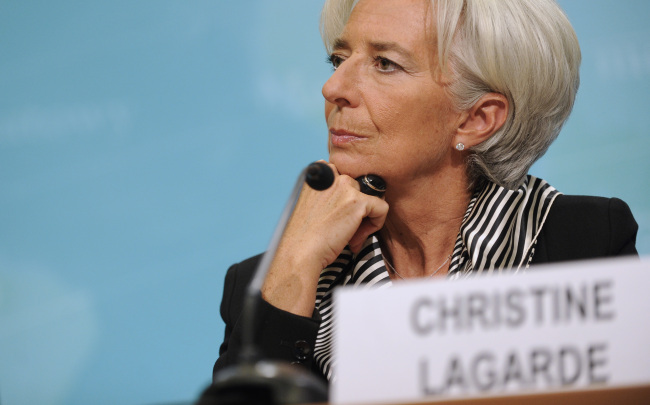 Managing Director of the International Monetary Fund Christine Lagarde attends a news conference on the outlook of global economy in 2013 in Washington D.C. on Thursday.   Xinhua-Yonhap News