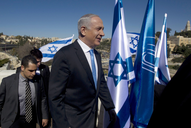 Israeli Prime Minister Benjamin Netanyahu walks as he arrives to brief the media in Jerusalem on Monday.   AP-Yonhap News