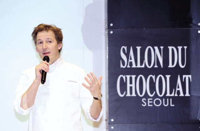 Chocolatier Pierre Marcolini talks about the future of chocolate and the bean-to-bar movement at a seminar held at the Salon du Chocolat Seoul 2013 last Friday in COEX, Samseong-dong, Seoul. (Park Hae-mook/The Korea Herald)