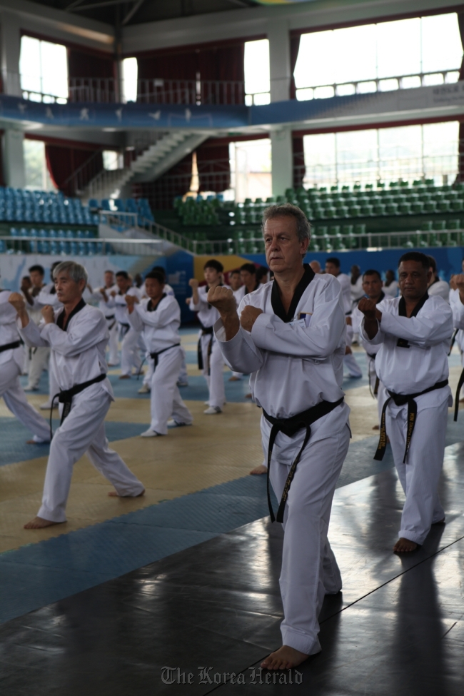 Taekwondo instructors from Europe, the U.S. and other parts of the world participate in a taekwondo leadership course at Kukkiwon World Taekwondo Headquarters in Seoul on Aug. 1, 2012.    Kukkiwon World Taekwondo Headquarters