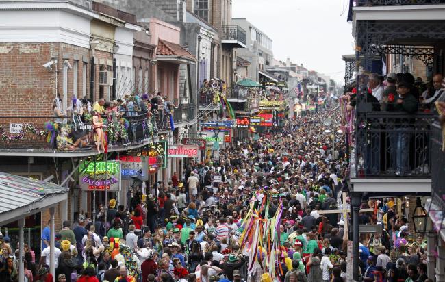 Crowds throng Bourbon Street in the French Quarter on Mardi Gras in New Orleans in this March 8, 2011, file photo.   AP-Yonhap News