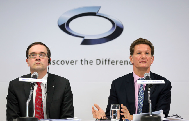 Gilles Normand (right), Renault Group chairman for the Asia-Pacific region, speaks during a press conference held at Renault Samsung Motors’ headquarters in Gasan-dong, western Seoul, on Friday. Next to him is Renault Samsung CEO Francois Provost.   Yonhap News