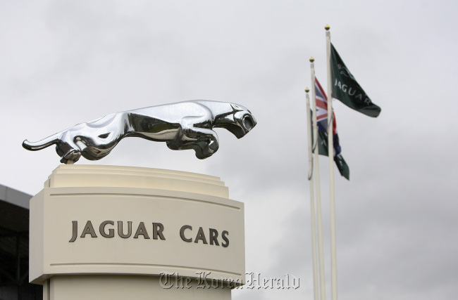 The Jaguar marque sits on display at the entrance to the carmakers Castle Bromwich assembly plant in Birmingham, England.   Bloomberg