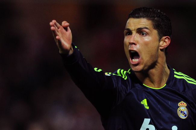 Real Madrid’s Cristiano Ronaldo reacts during a Spanish league match against Granada on Saturday. Granada pulled off a shock 1-0 victory.   AFP-Yonhap News