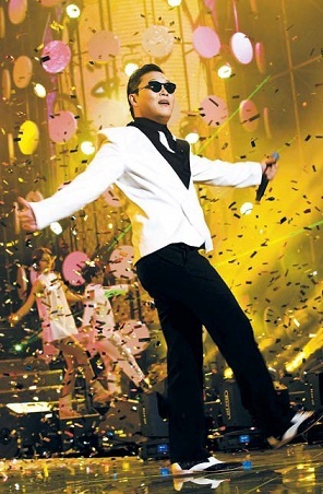 South Korean singer Psy dances as he sings his hit single “Gangnam Style” during a concert at Nanjing Olympic Sports Center in Nanjing, China, Saturday. (Xinhua-Yonhap News)