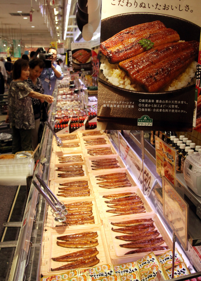 Grilled eels from Kagoshima Prefecture are displayed for sale at an Aeon Co. supermarket in Tokyo, Japan.   Bloomberg
