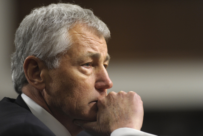 <YONHAP PHOTO-0330> Republican Chuck Hagel, President Obama's choice for defense secretary, testifies before the Senate Armed Services Committee during his confirmation hearing, on Capitol Hill in Washington, Thursday, Jan. 31, 2013. (AP Photo/Susan Walsh)/2013-02-01 05:59:23/ <저작권자 ⓒ 1980-2013 ㈜연합뉴스. 무단 전재 재배포 금지.>
Chuck Hagel   AP-Yonhap News