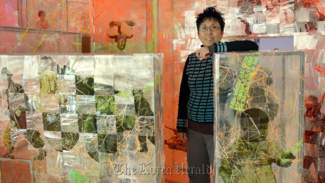Artist Lee Eun-sook poses for a photo in her studio in Seoul.   Kim Myung-sub/The Korea Herald