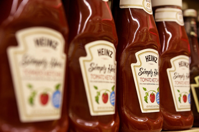 Bottles of H.J. Heinz Co. ketchup products are displayed on a shelf for sale at grocery store in Pittsburgh, Pennsylvania,Thursday.   Bloomberg