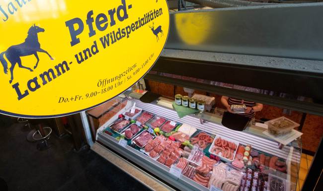 Horse meat is on display at a meat stand in the market hall in Hanover, northern Germany.   AFP-Yonhap News