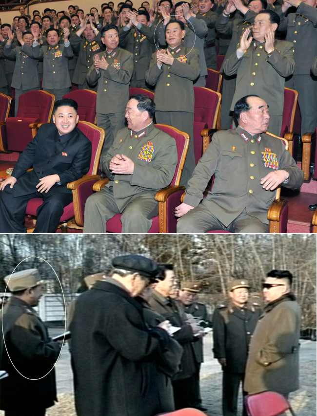 Kim Yong-chol (circled), claps during a recent national choir performance behind leader Kim Jong-un (left, front row) in this photo carried by the Rodong Shinmun on Tuesday.   Yonhap News