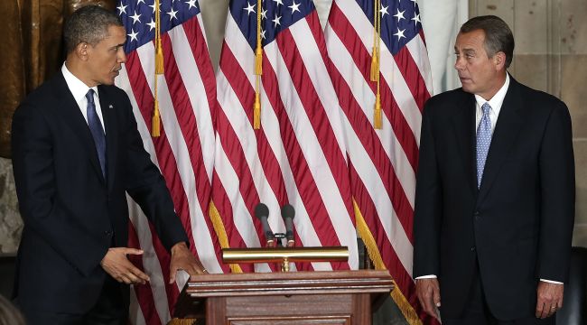 U.S. President Barack Obama (left) and Speaker of the House John Boehner take part in a ceremony to unveil a statue honoring the late civil rights activist Rosa Parks in Statutory Hall of the U.S. Capitol in Washington, D.C. on Wednesday.   AFP-Yonhap News