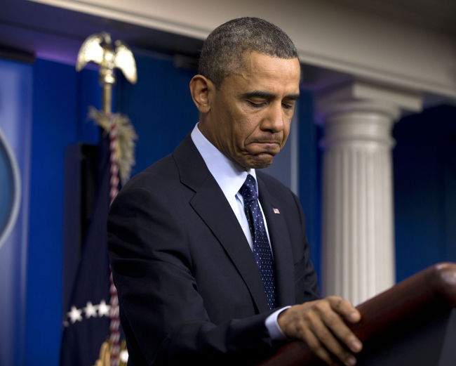 President Barack Obama pause as he speaks to reporters in the White House briefing room in Washington, Friday, following a meeting with congressional leaders regarding the automatic spending cuts. (AP)