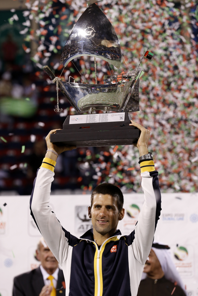 <YONHAP PHOTO-0160> Novak Djokovic of Serbia with the trophy after winning the Dubai Duty Free Tennis Championships in Dubai, United Arab Emirates, Saturday, March 2, 2013. (AP Photo/Regi Varghese)/2013-03-03 05:18:24/ <저작권자 ⓒ 1980-2013 ㈜연합뉴스. 무단 전재 재배포 금지.>
Novak Djokovic poses with the winner’s trophy.   AP-Yonhap News
Novak Djokovic poses with the winner’s trophy.   AP-Yonhap News