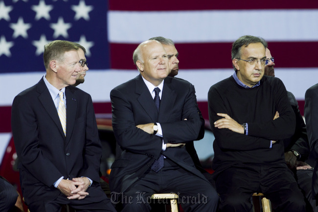 (From left) Alan Mulally, president and chief executive officer of Ford Motor Co., Dan Akerson, chief executive officer of General Motors Co., and Sergio Marchionne, chief executive officer of Chrysler Group LLC and chairman of Fiat SpA.   Bloomberg