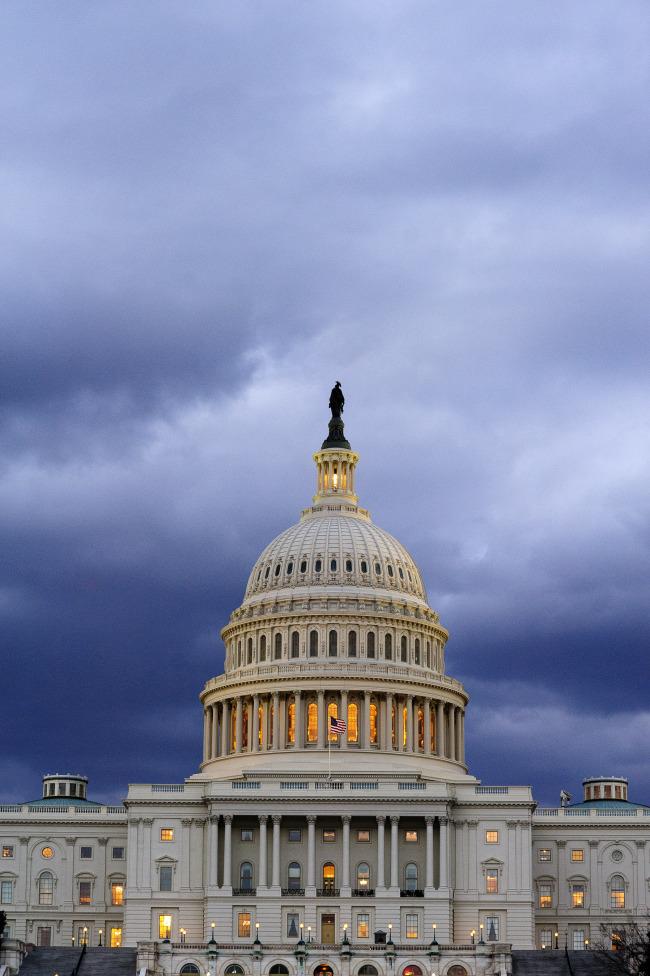 Dark clouds hang over the U.S. Capitol in Washington, D.C., U.S., on Thursday, Feb. 28, 2013. Democrats and Republicans are in a standoff over how avert $85 billion in federal spending cuts set to start before midnight on March 1. Photographer: Pete Marovich/Bloomberg
Dark clouds hang over the U.S. Capitol in Washington, D.C.   Bloomberg