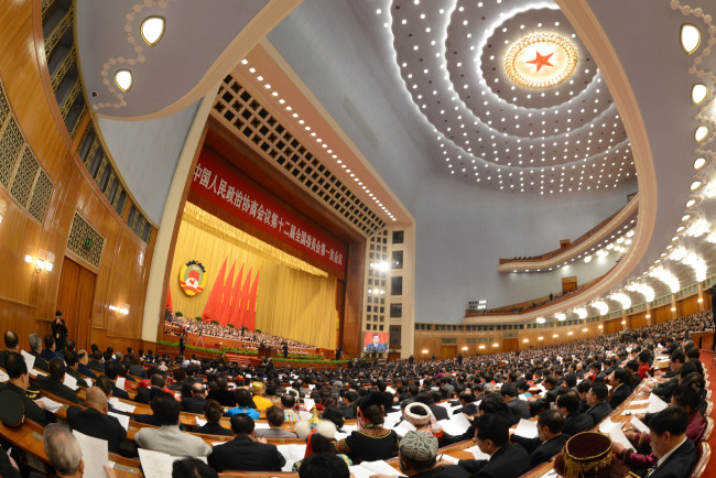The first session of the 12th National Committee of the Chinese People’s Political Consultative Conference opens at the Great Hall of the People in Beijing on Sunday.   Xinhua-Yonhap News