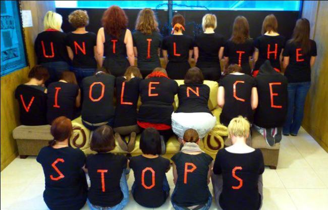 Participants of last year’s V-Day Busan events form a message on their backs.   Jen Sotham