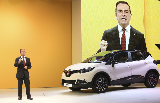 Renault CEO Carlos Ghosn speaks at the 83rd Geneva International Motor Show on Tuesday.   Bloomberg