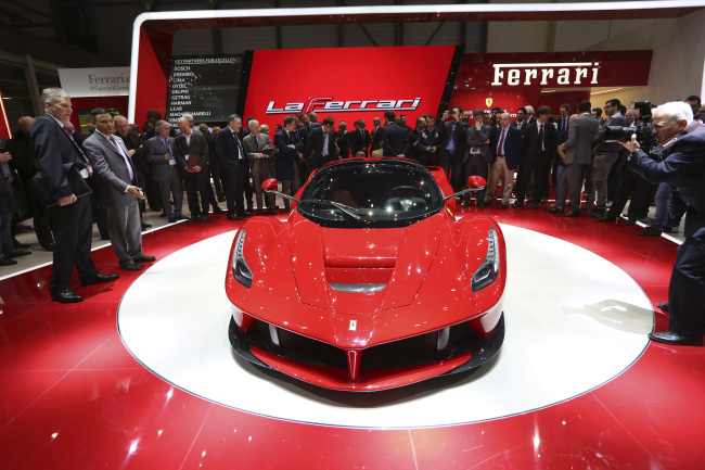 The new Ferrari La Ferrari (F150) automobile, produced by Ferrari SpA, is launched on the first day of the 83rd Geneva International Motor Show in Geneva, Switzerland, on Tuesday, March 5, 2013. This year's show opens to the public on Mar. 7, and is set to feature more than 100 product premiers from the world's automobile manufacturers. Photographer: Chris Ratcliffe/Bloomberg
The new “LaFerrari”   Bloomberg