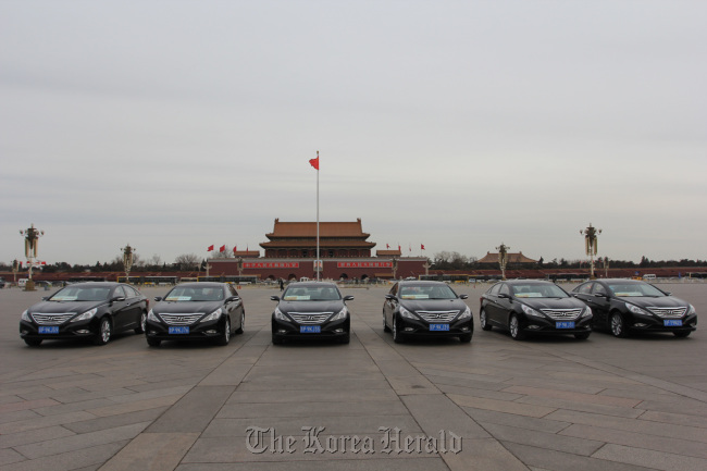 Hyundai Motor’s Sonata sedans are displayed on Tiananmen Square in Beijing.   Hyundai Motor