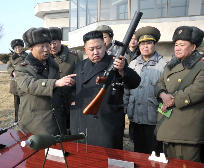 Kim Jong-un, the first chairman of the National Defense Commission, offers an instruction to his troops during artillery drills last month.   Yonhap News.