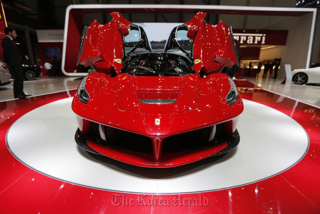 The new Ferrari La Ferrari automobile, produced by Ferrari SpA, is seen on display during the Geneva International Motor Show last week.   Bloomberg