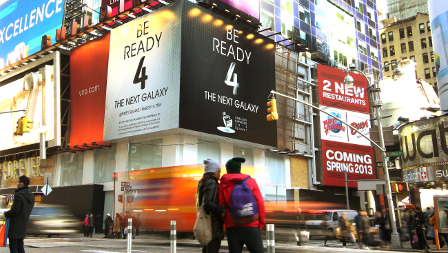 Signboards at Times Square in New York advertise Samsung’s upcoming release of its Galaxy S4 smartphone.   Samsung Electronics
