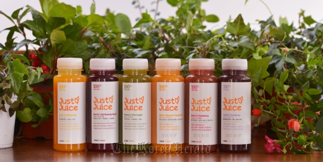 Herald Ecofarm’s Just Juice line of 100 percent natural fruit juice drinks.   Herald Corp.