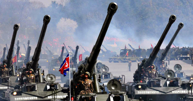 This photo, carried Wednesday by the Rodong Sinmun, the daily of North Korea’s ruling Workers’ Party, shows a military inspection presumed to have taken place last April to mark the centennial birthday of the country’s late national founder Kim Il-sung.   Yonhap News