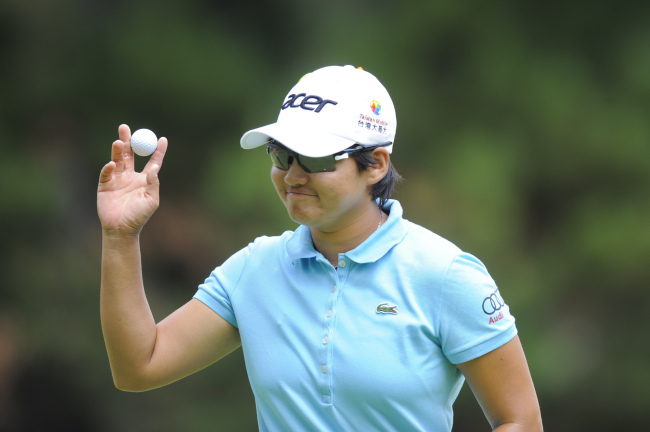 청야니(YaniTseng/골퍼)
<YONHAP PHOTO-1235> Taiwanese golfer Yani Tseng reacts after a successful putt during her third round at the Royal Canberra Golf Club in Canberra, Saturday, Feb. 16, 2013. The Royal Canberra Golf Club is hosting the ISPS Handa Australian Open. (AAP Image/Lukas Coch) NO ARCHIVING, EDITORIAL USE ONLY/2013-02-16 18:17:12/ <저작권자 ⓒ 1980-2013 ㈜연합뉴스. 무단 전재 재배포 금지.>
World No. 1 Yani Tseng   Yonhap News