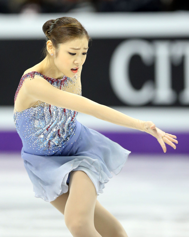 김연아(스케이트선수)
South Korean figure skater Kim Yu-na finished first in the ladies' short program at the  world championships here in Canada on Thursday.