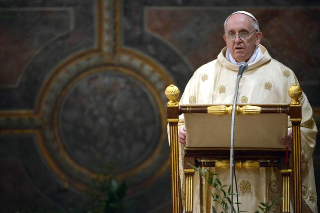 Pope Francis leads a Mass at the St. Peter’s Basilica at the Vatican on Thursday.   AFP-Yonhap News