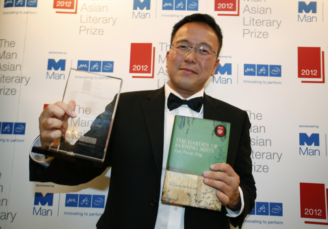 Malaysian author Tan Twan Eng poses after his novel “The Garden of Evening Mists” won the 2012 Man Asian Literary Prize in Hong Kong Thursday.   AP-Yonhap News