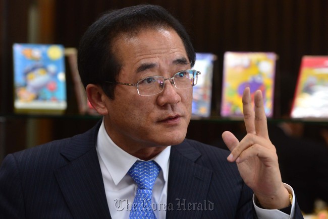 Korea Creative Content Agency President and CEO Hong Sang-pyo poses for The Korea Herald at his office in Sangam-dong, Seoul, Thursday.   Lee Sang-sub/The Korea Herald