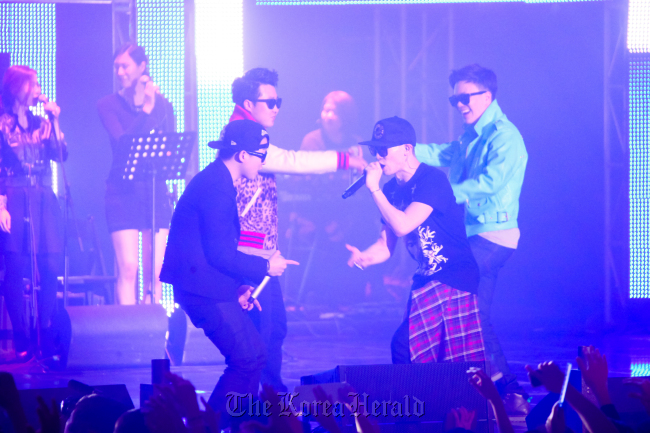 Amoebaculture artists perform live onstage at the 2013 Amoebahood Concert at the Olympic Hall in Seoul on Saturday.   CJ E&M