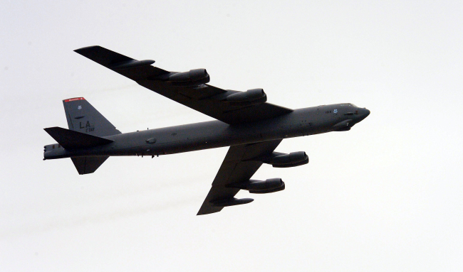 A U.S. Air Force B-52 bomber flies over Pyeongtaek, Gyeonggi Province, Tuesday as part of Korea-U.S. joint military drills.   Hankook Ilbo