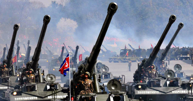 This photo, carried Wednesday by the Rodong Sinmun, the daily of North Korea’s ruling Workers’ Party, shows a military inspection presumed to have taken place last April to mark the centennial birthday of the country’s late national founder Kim Il-sung. (Yonhap News)