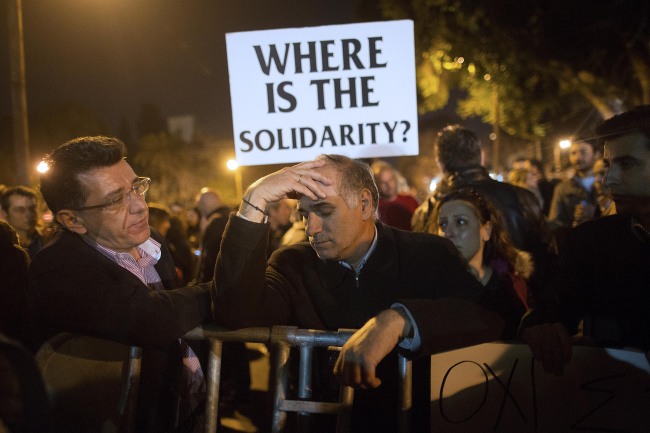 Demonstrators protest outside the parliament in Nicosia, Cyprus, Thursday.   Bloomberg
