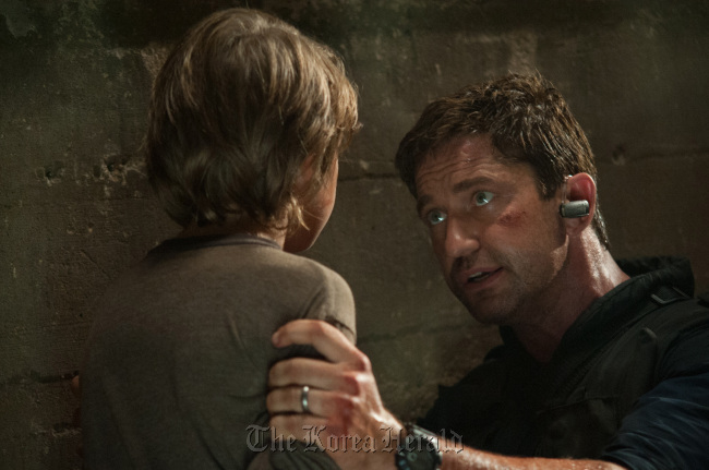 Finley Jacobsen (left) and Gerard Buter star in “Olympus Has Fallen.”   FilmDistrict/MCT