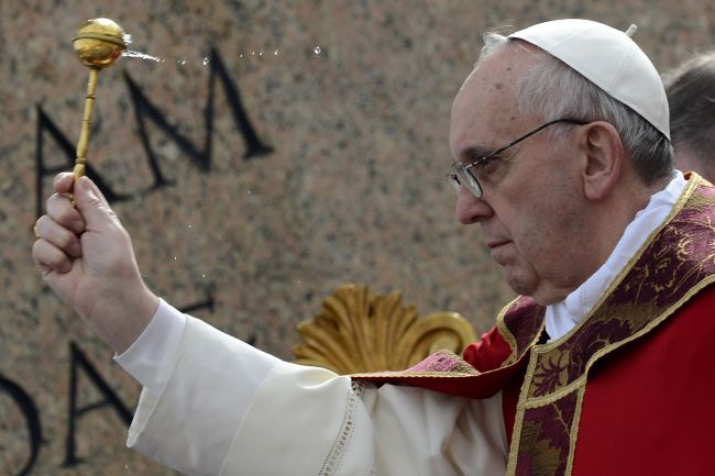 Pope Francis blesses the palms before a papal Mass as part of the Palm Sunday celebration on St. Peter’s Square at the Vatican on Sunday.   AFP-Yonhap News