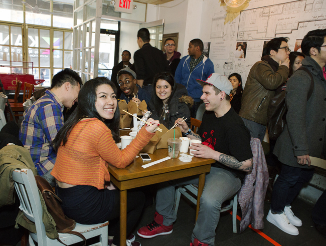 Guests have a good time at the KANA’s pop-up kitchen.  Courtesy of KANA