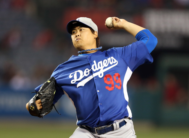 <YONHAP PHOTO-0653> Los Angeles Dodgers starting pitcher Ryu Hyun-jin delivers in the first inning of an exhibition spring training baseball game against the Los Angeles Angels in Anaheim, Calif., Thursday, March 28, 2013. (AP Photo/Christine Cotter) /2013-03-29 13:02:33/ <저작권자 ⓒ 1980-2013 ㈜연합뉴스. 무단 전재 재배포 금지.>
Ryu Hyun-jin had a solid spring training, going 2-2 with a 3.29 ERA in six starts and one relief outing.   AP-Yonhap News