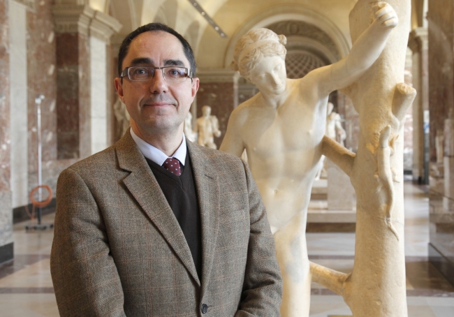 Jean-Luc Martinez poses for a photograph in the Louvre in this undated photo provided by the Louvre museum, Paris.   AP-Yonhap News
